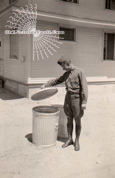 soldier-checking-trash-can.jpg