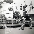 Watching The Carnival Rides - July 1958