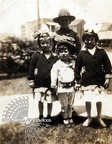 Four Well Dressed Children in School Uniforms