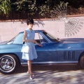 Pretty Lady With 1960s Corvette Stingray