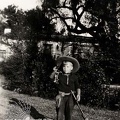 Kid Playing, Dressed as a Cowboy