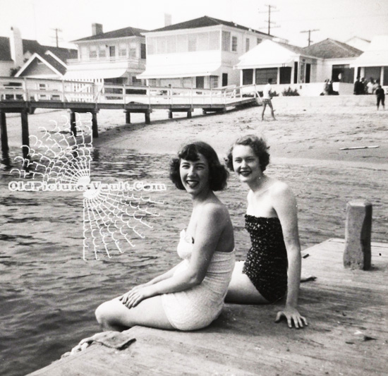 two-girls-wearing-a-big-smile-and-bathing-suits-1953.jpg